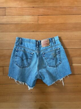 Vintage Levi’s 535 mid blue cut offs 90s wide leg mid thigh